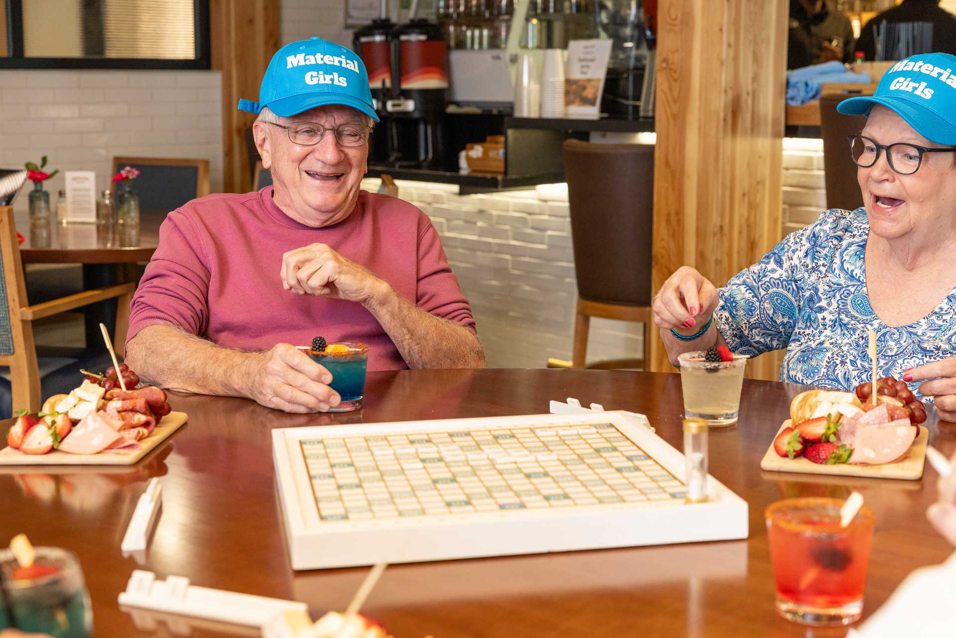Two older adults in blue 